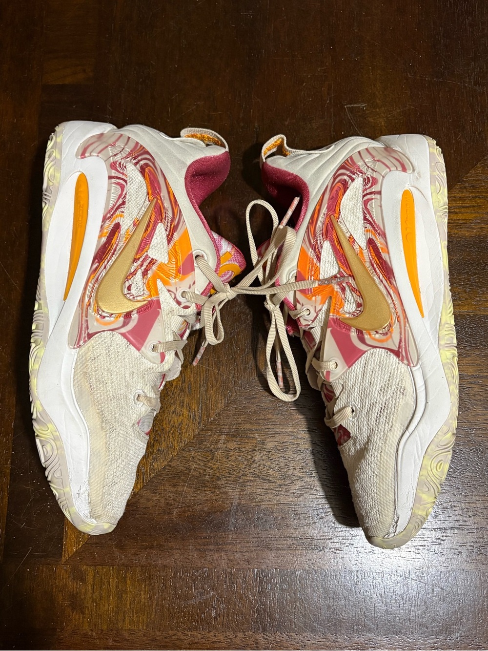 Nike Women's Cream Sneakers with Pink and Orange Accents